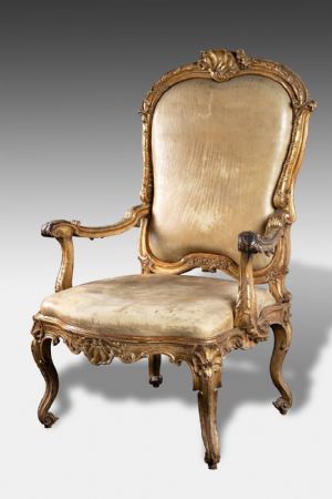 Carved and gilded wooden armchair - 18th century